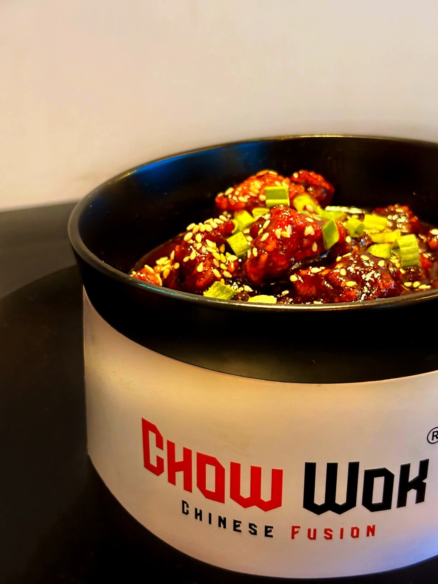 Photo for Crisp golden chicken and hot ginger-pepper beef over charred