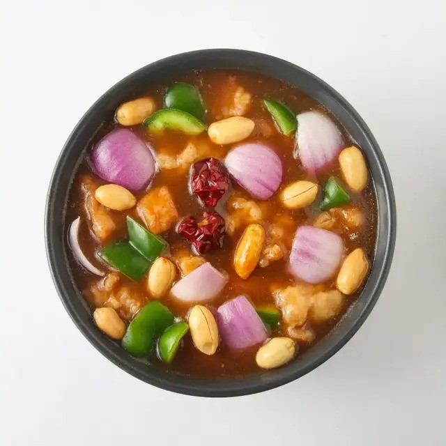 Photo for Wok-tossed with roasted peanuts, dried red chillies, and tha