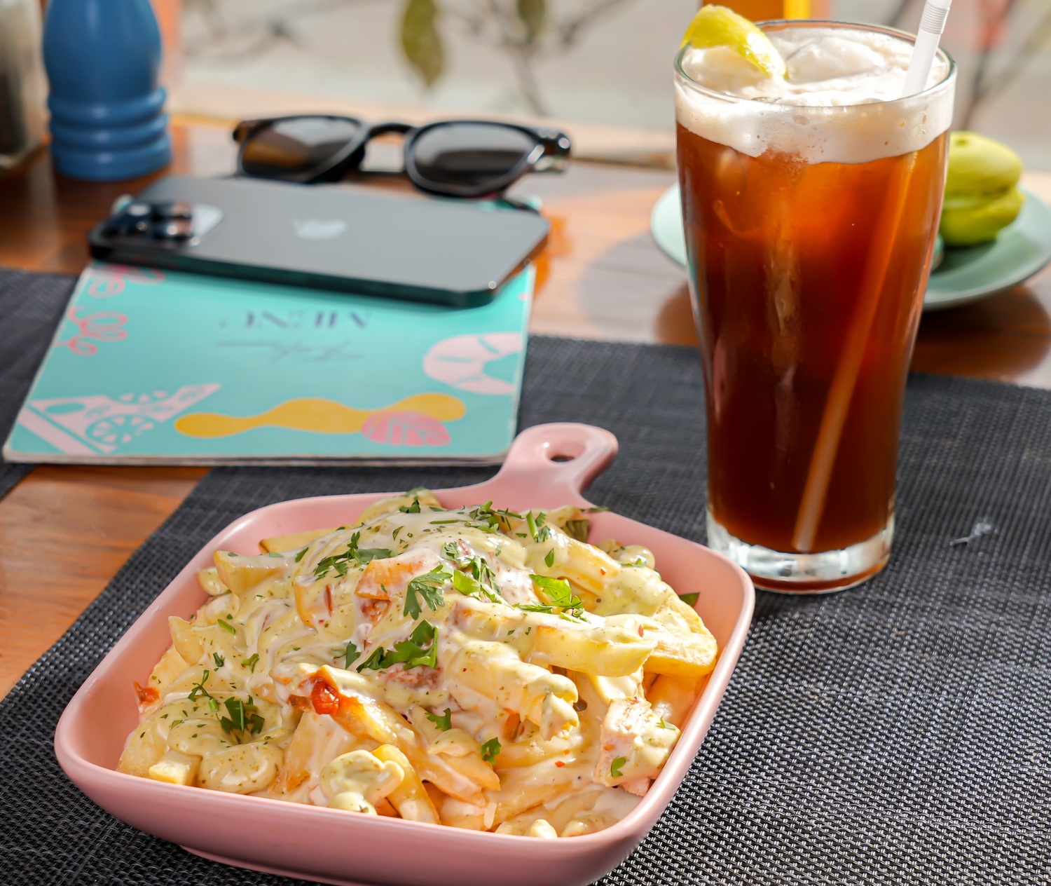 Photo for Crispy fries smothered in tender chicken and melted cheese,