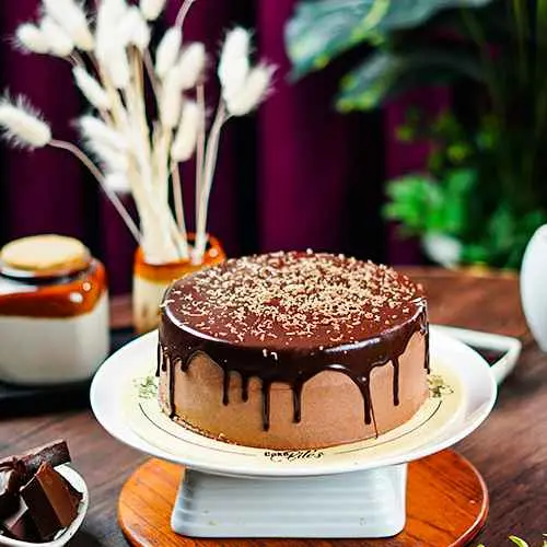 Photo for A rich and moist chocolate fudge cake with creamy layers tha
