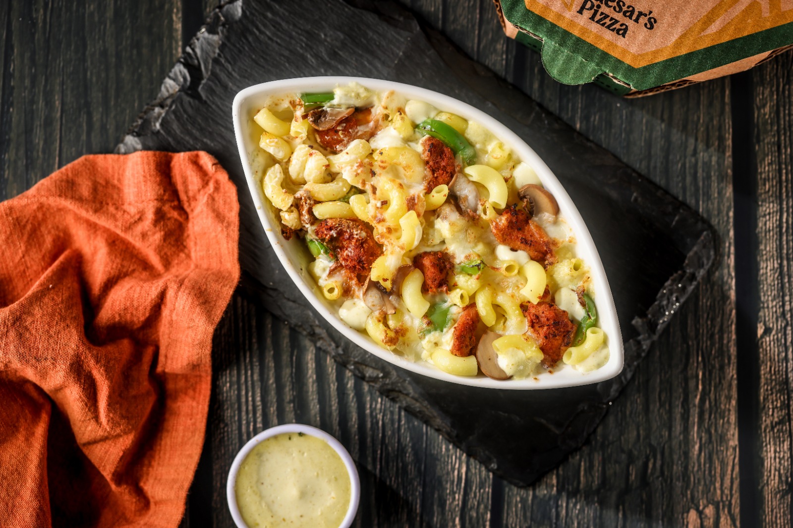 Photo for Creamy mac loaded with real cheese, crispy wings in Caesar's