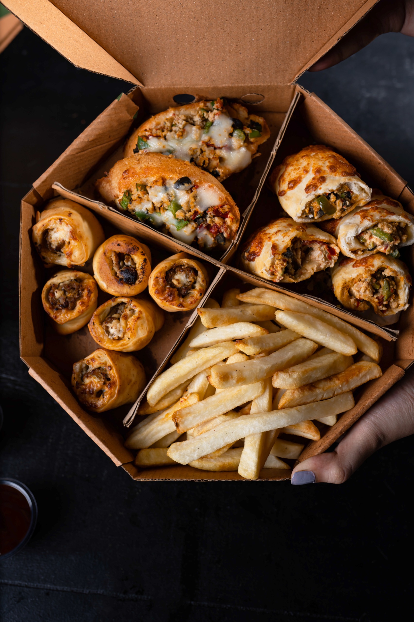 Photo for Crispy starters meet gooey cheese pull, grilled to that perf
